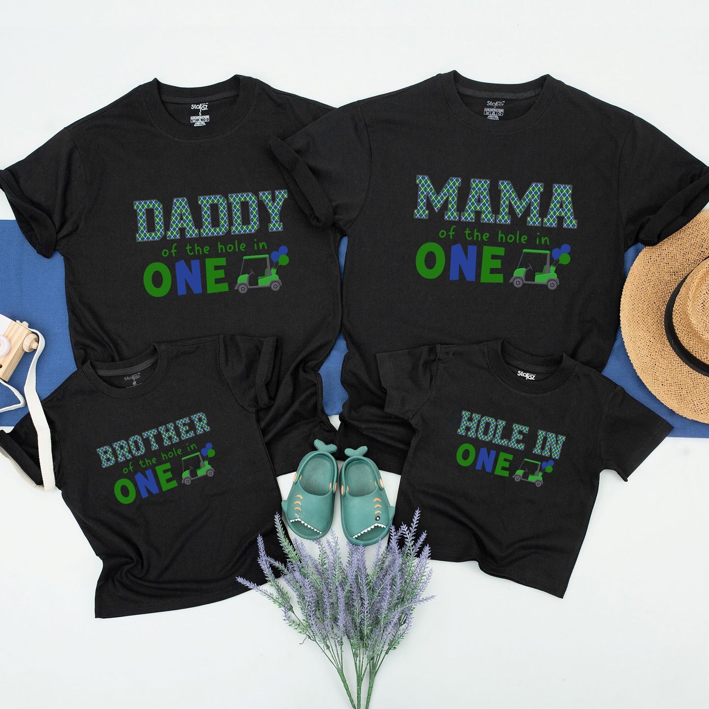 Hole in One First Birthday Matching Family Golf Theme Party Shirt Outfit with Daddy Mama Brother Plaid Green Blue Design and playful Golf Cart Blue Balloons perfect for an unforgettable celebration.