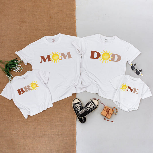 First Trip Around the Sun Birthday Matching Family Shirts & Bodysuit with Cheerful Yellow Sun DAD MOM BRO ONE Block Letters Design Soft Cotton