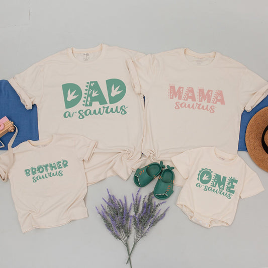 Custom Family Dinosaur Birthday Party Shirts featuring Prehistoric Font Scales and Footprints for Matching Dino Outfits Sage Green Salmon Pink