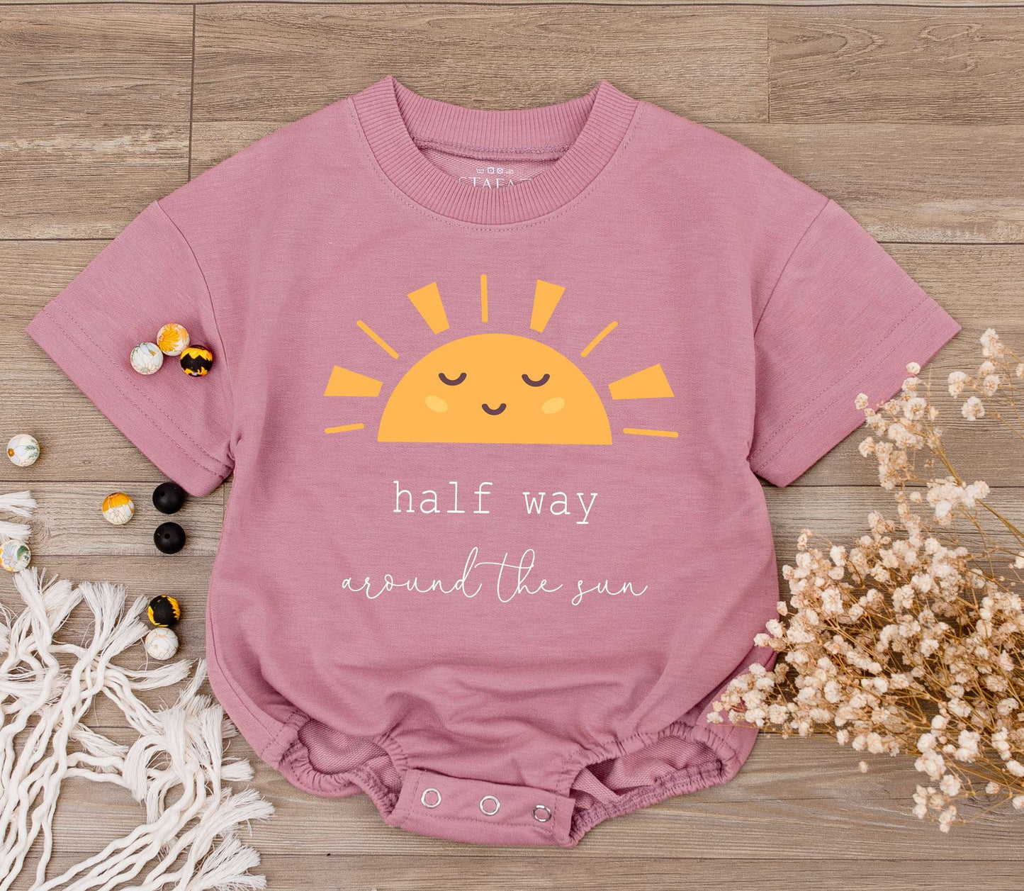 Baby Half Way Around The Sun Romper for 6 Month Birthday Celebration featuring a playful smiling sun graphic soft cotton natural gift outfit
