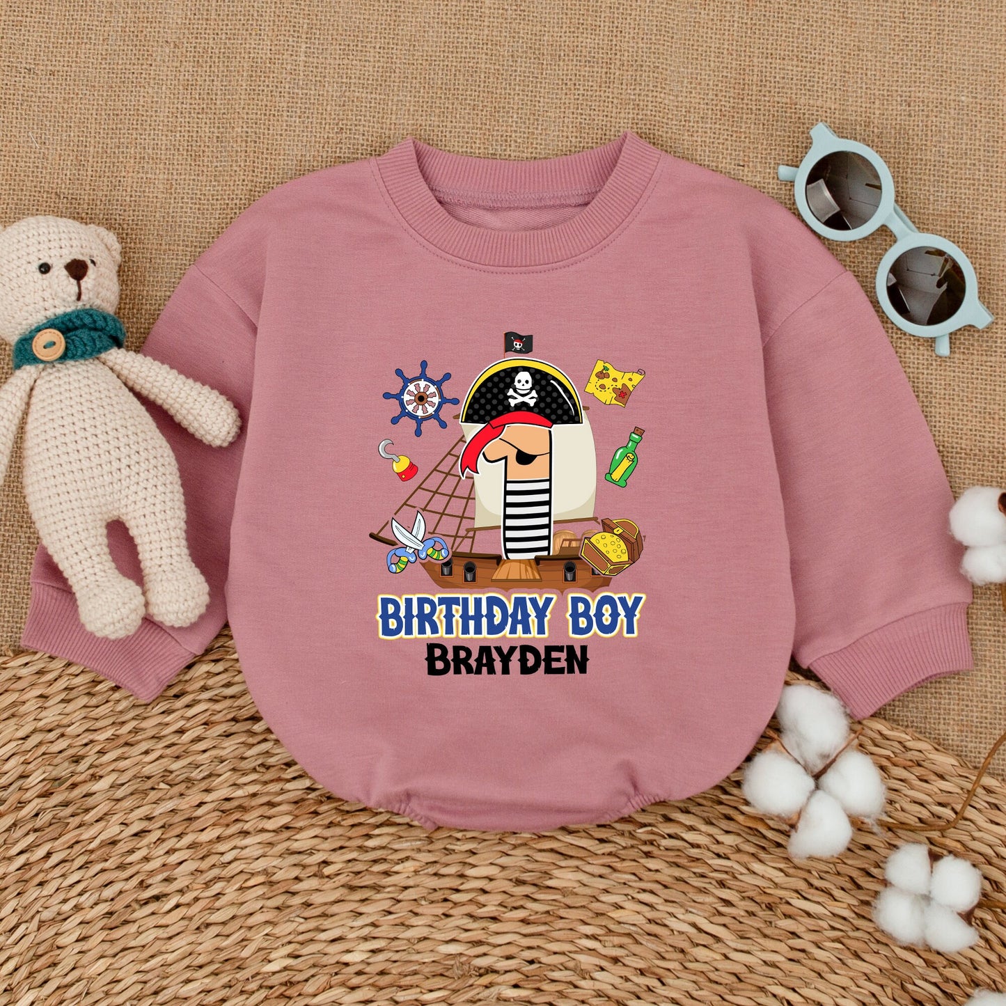 Personalized Pirate First Birthday Boy Romper featuring a Whimsical Cartoon One with Eye Patch Hat and Treasure Design Bodysuit