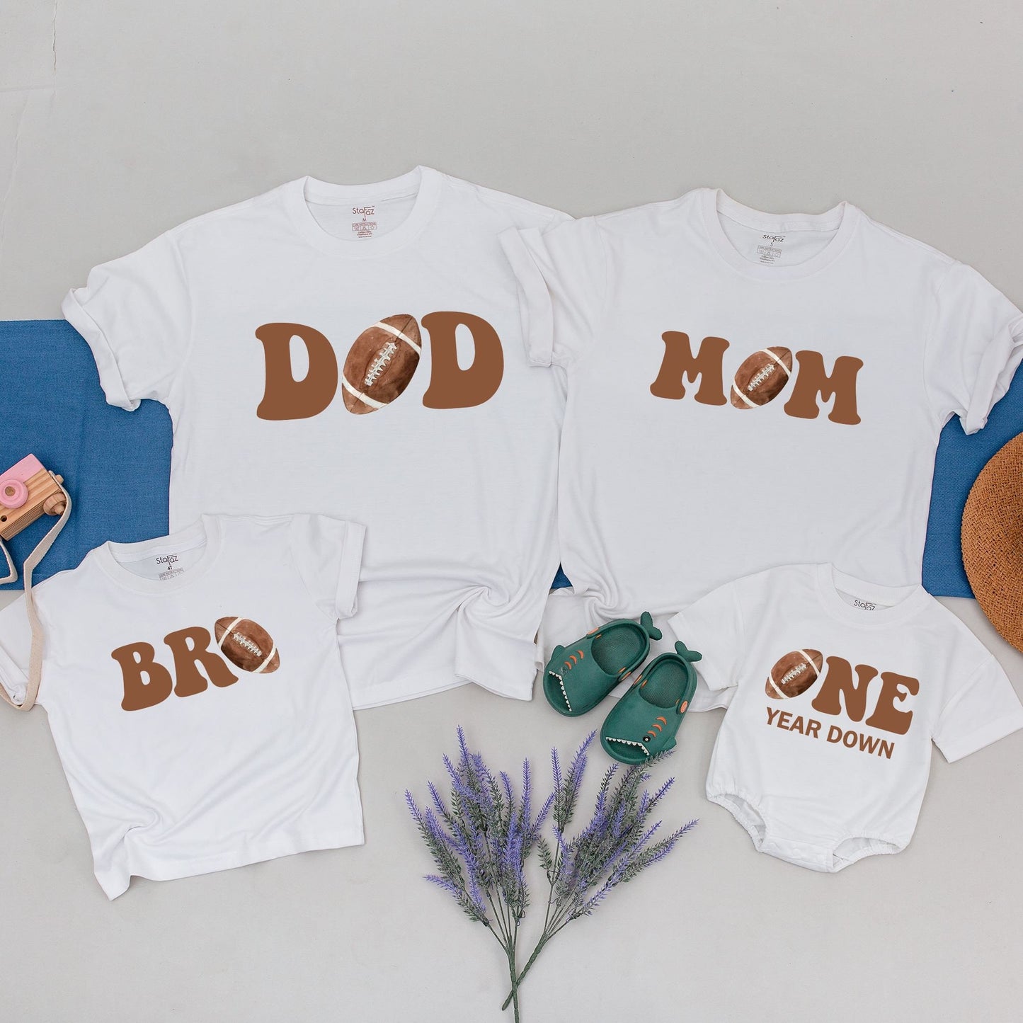 One Year Down Football First Birthday Matching Family Shirts with Brown Block Lettering Realistic Sports Game Day Theme Party Outfits