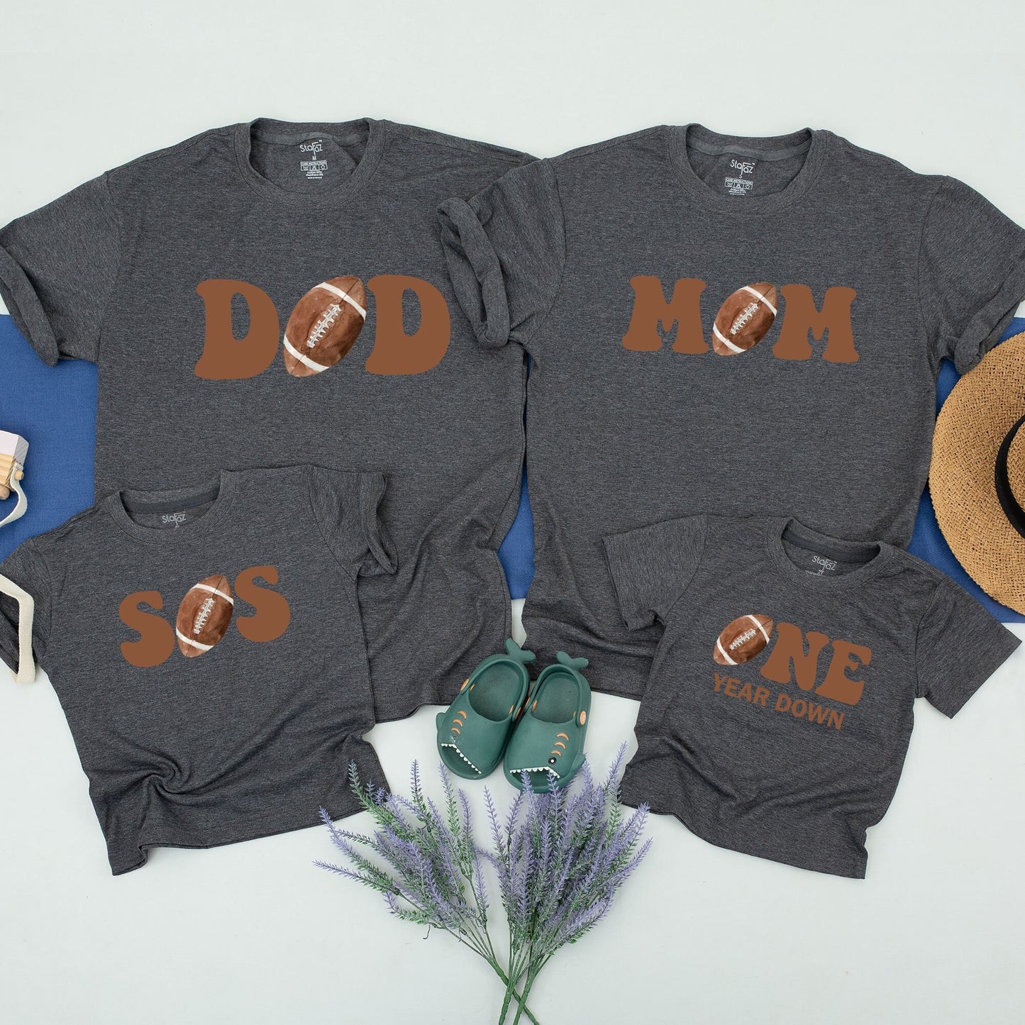 One Year Down Football First Birthday Matching Family Shirts with Brown Block Lettering Realistic Sports Game Day Theme Party Outfits