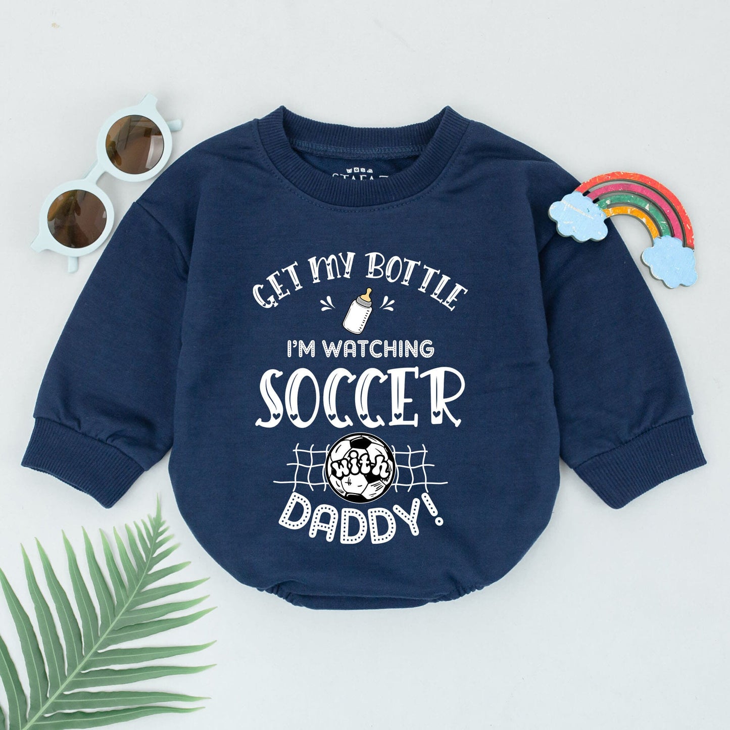 Get My Bottle I'm Watching Soccer With Daddy Baby Boy Romper adorable Father's Day Game Day outfit with whimsical black print baby bottle and soccer ball design
