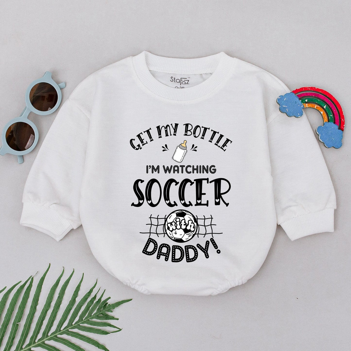 Get My Bottle I'm Watching Soccer With Daddy Baby Boy Romper adorable Father's Day Game Day outfit with whimsical black print baby bottle and soccer ball design