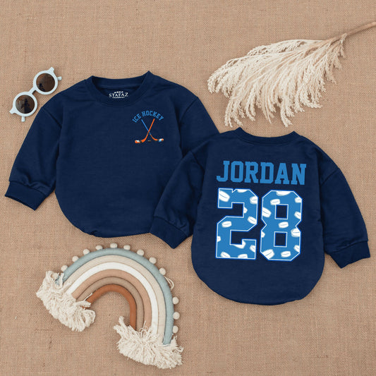 Personalized Baby Ice Hockey Bubble Romper with Name and Number 28, featuring Crossed Sticks and Puck Pattern, Future Player Newborn Gift for Little Fan