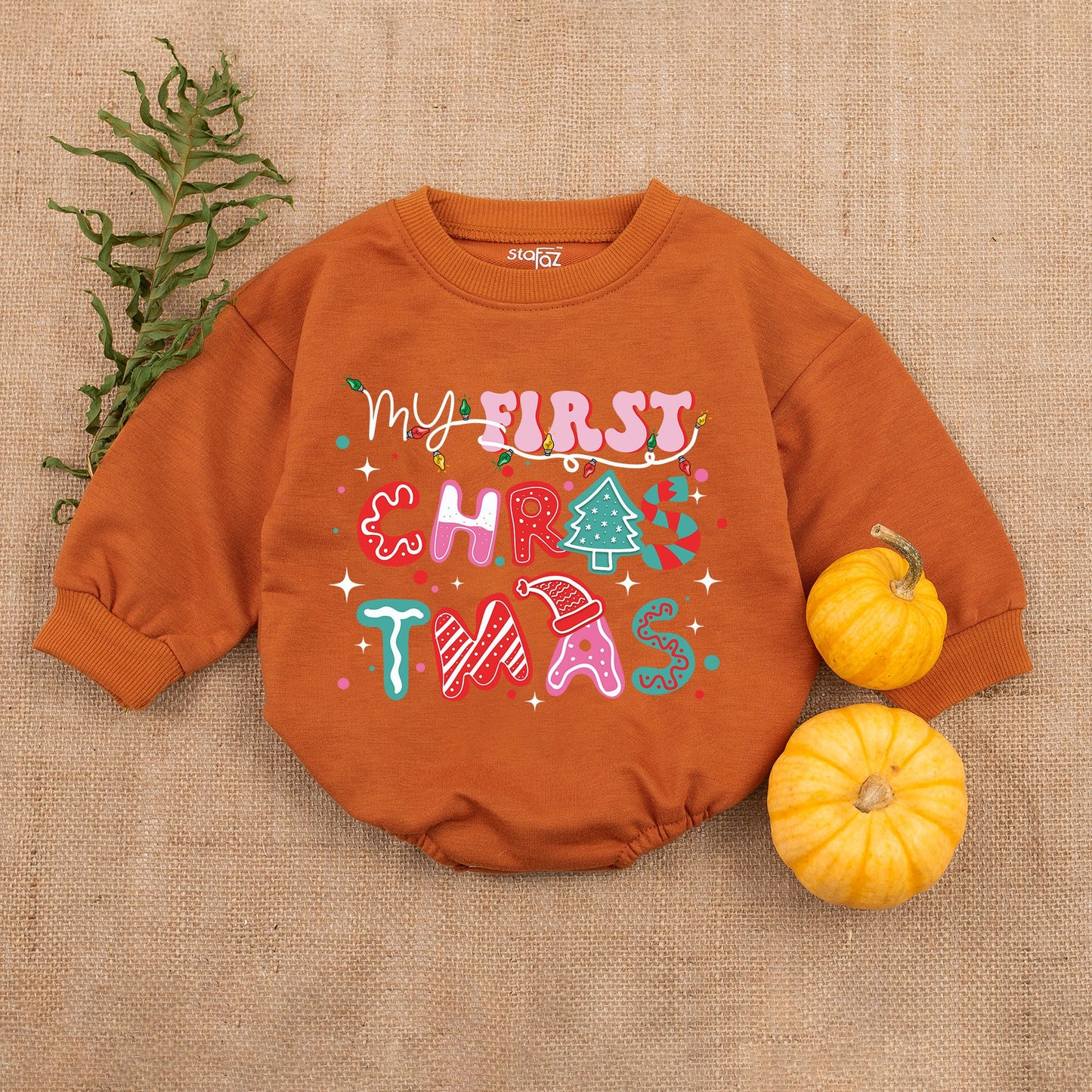 My First Christmas Baby Romper Colorful Lights Print Outfit, playful whimsical long sleeve bodysuit with pink red teal patterns perfect for baby's first holiday gift