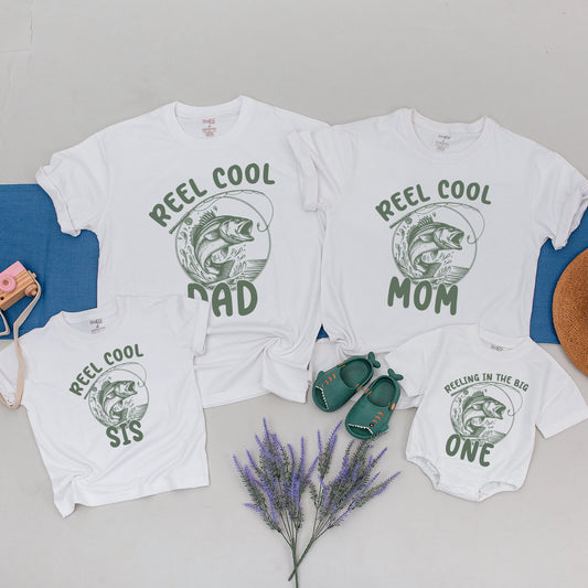 Reel Cool 1st Birthday Fishing Shirt Baby Boy Rustic Bass Family Matching Tee Outfit Muted Olive Vintage Design Short Sleeve Comfortable