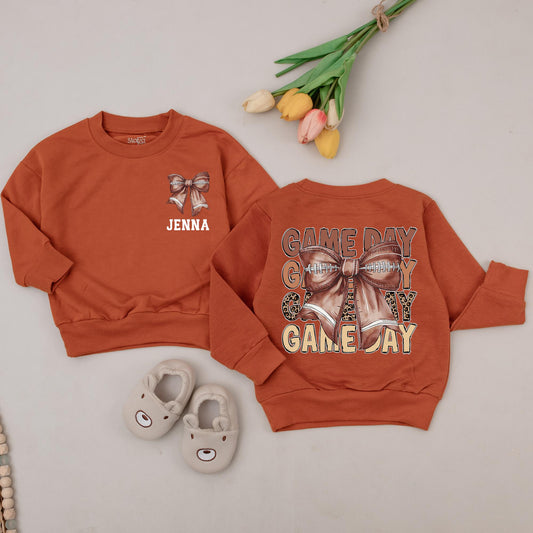 Personalized Baby Girl Game Day Football Outfit Retro Bow Bubble Romper Vintage Animal Print Jenna Name Brown Hue Sweatshirt
