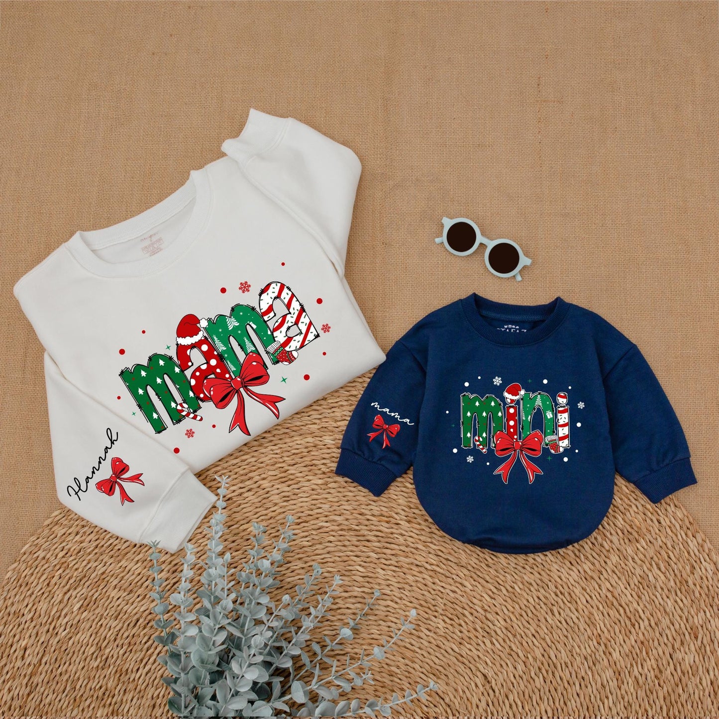 Personalized Christmas Mama Mini Matching Sweatshirt and Baby Romper featuring festive joyful candy cane Santa hat Christmas tree designs and red bows