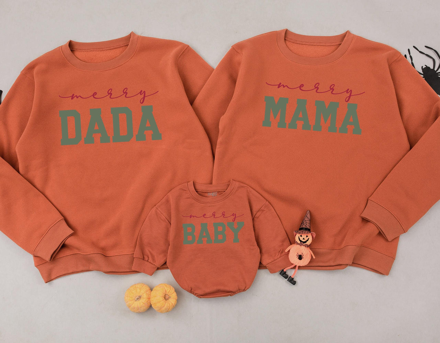 Matching Family Christmas Sweatshirts with Merry Mama Dada Baby Design Cozy Holiday Outfits Red Cursive Green Bold Font Comfortable Tops