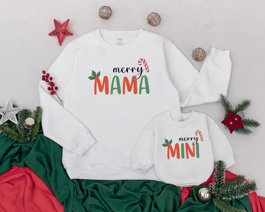 Personalized Mama and Mini Christmas Sweatshirts with festive Merry Mama Mini candy cane and holly designs for holiday family comfort