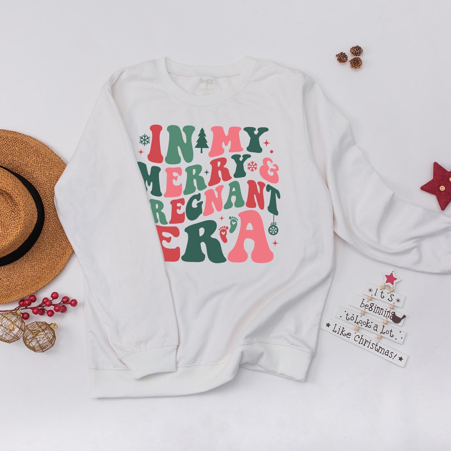 In my Merry & Pregnant Era Christmas Sweatshirt, Groovy Font Holiday Pregnancy Reveal, Xmas Gift for Mom, Red Green Pink Snowflakes