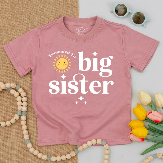 Promoted To Big Sister Toddler T-Shirt Smiling Sun Graphic White Letters Starbursts Cute Announcement Baby Gift