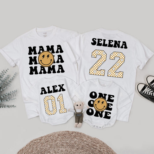 Matching One Happy Dude 1st Birthday Family Shirt Set: Retro Smiley Face Design with Black Fonts, Gold Checkerboard Numbers & Lightning Bolt Eyes (138 chars)