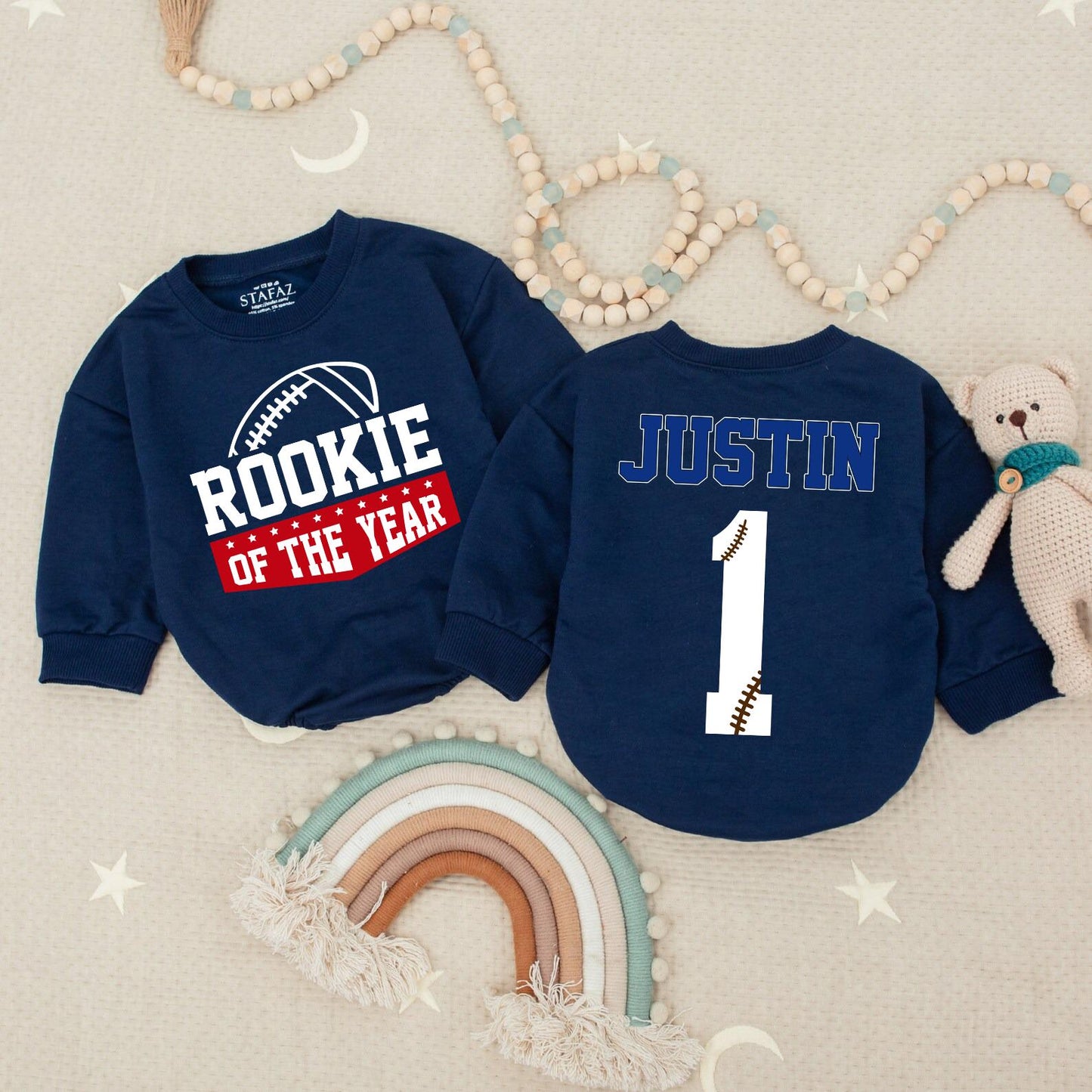 Rookie of the Year Football Baby Romper for First Birthday Celebrations Bold Blue Red Stars Playful Sports Theme Outfit