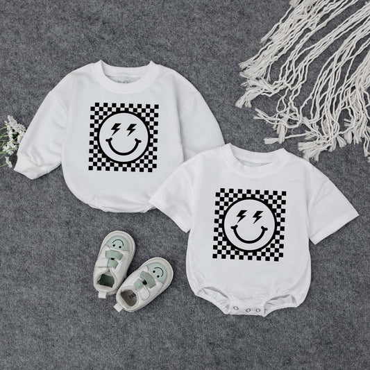 Retro Smiley Baby Romper Checkered Fun! Grandbaby Bodysuit Vintage Newborn Bubble Romper Announcement Gift Lightning Bolt Eyes Playful 1960s Style