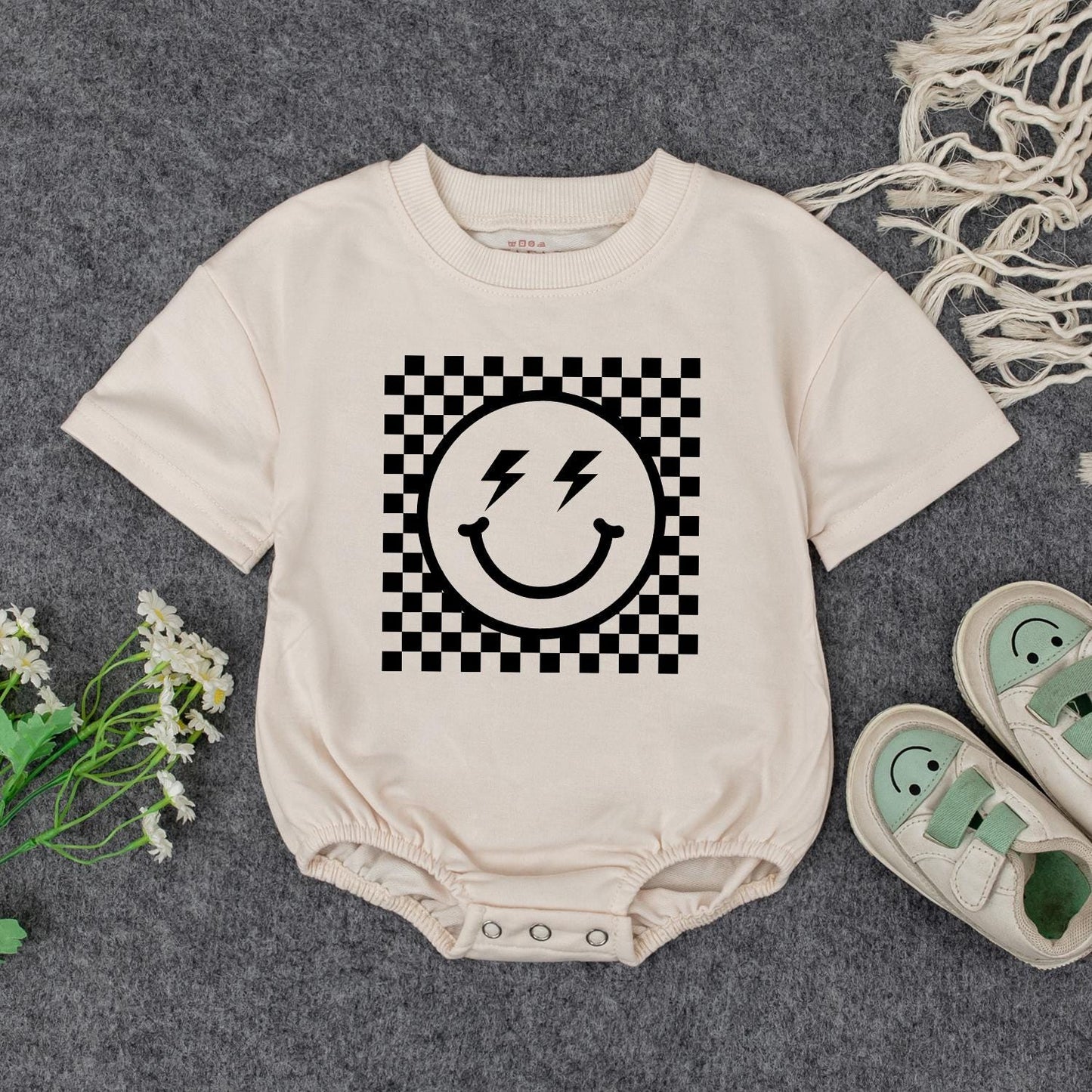 Retro Smiley Baby Romper Checkered Fun! Grandbaby Bodysuit Vintage Newborn Bubble Romper Announcement Gift Lightning Bolt Eyes Playful 1960s Style