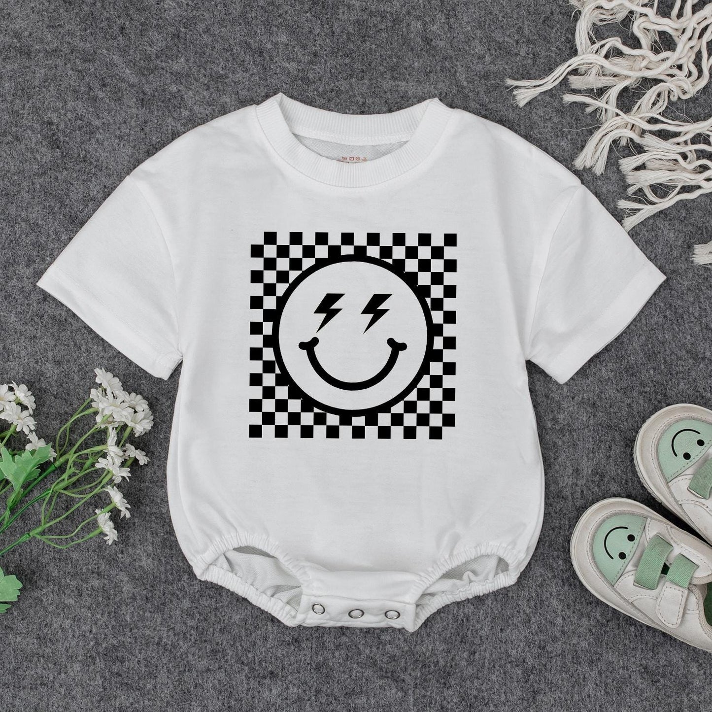 Retro Smiley Baby Romper Checkered Fun! Grandbaby Bodysuit Vintage Newborn Bubble Romper Announcement Gift Lightning Bolt Eyes Playful 1960s Style