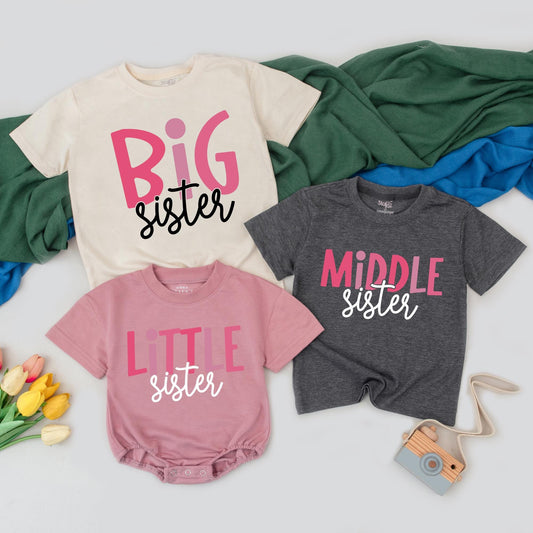 Personalized Sister Matching Outfits Big Middle Little Sister Shirts Baby Toddler Girl Whimsical Pink Black Cursive Font Sibling Reveal Gift