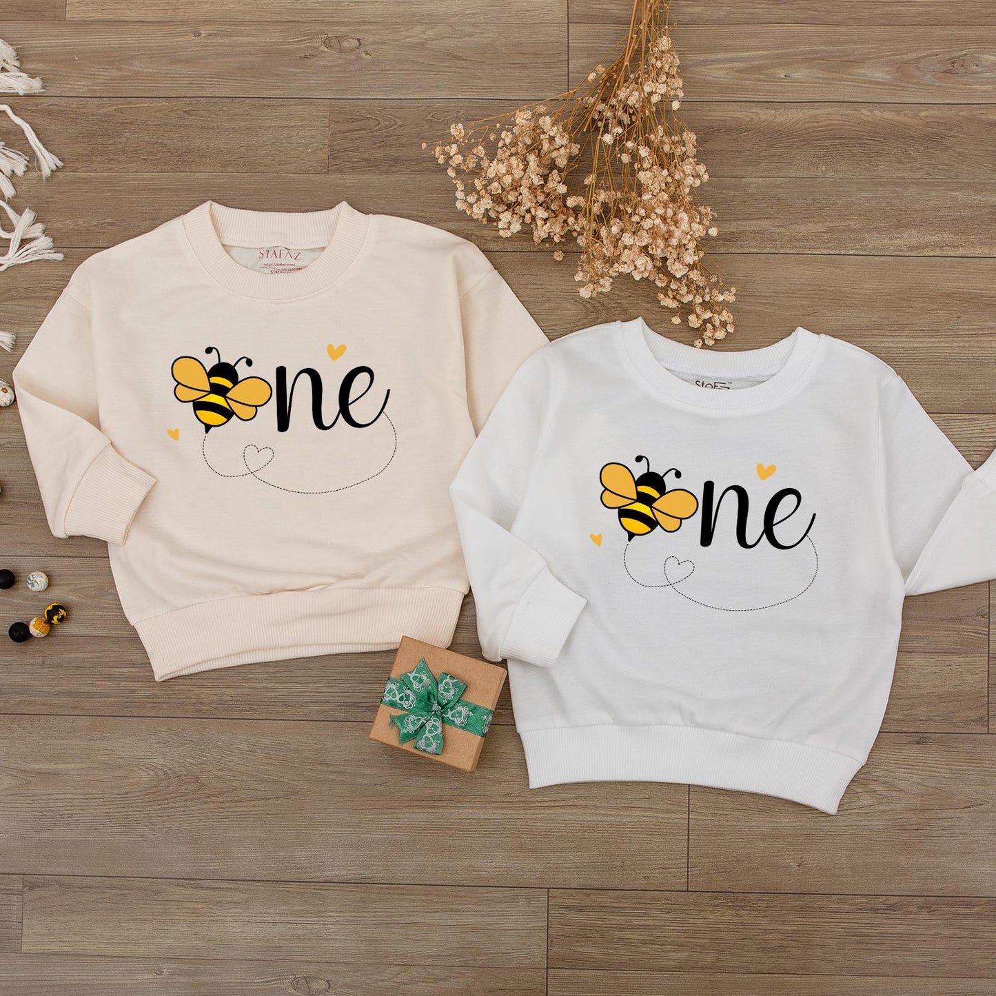 Sweet Bee First Birthday Romper, Cute One-sie with Flying Bee Design, Baby Girl Outfit, Yellow Hearts, Playful Party Clothes, Adorable Bee Day Gift (139 chars)