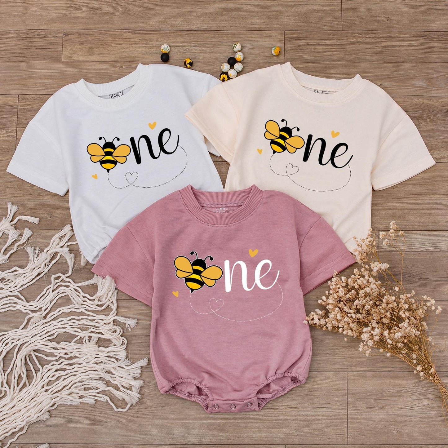 Sweet Bee First Birthday Romper, Cute One-sie with Flying Bee Design, Baby Girl Outfit, Yellow Hearts, Playful Party Clothes, Adorable Bee Day Gift (139 chars)