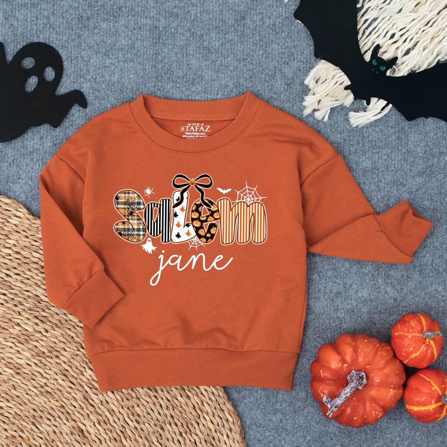 Personalized Spooky Jane Halloween Toddler Girl Sweatshirt with Stylized Letters Ghost Patterns Pumpkins Bats and Spiderwebs Fun Fall Costume