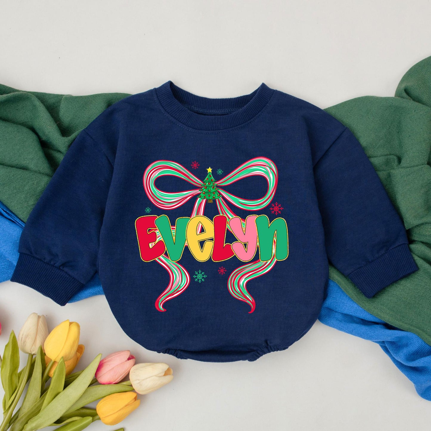 Evelyn's First Christmas Romper: Personalized Baby Girl Outfit with Colorful Bow & Snowflake Design, Custom Name Bodysuit for Festive Xmas Gift Idea (139 chars)