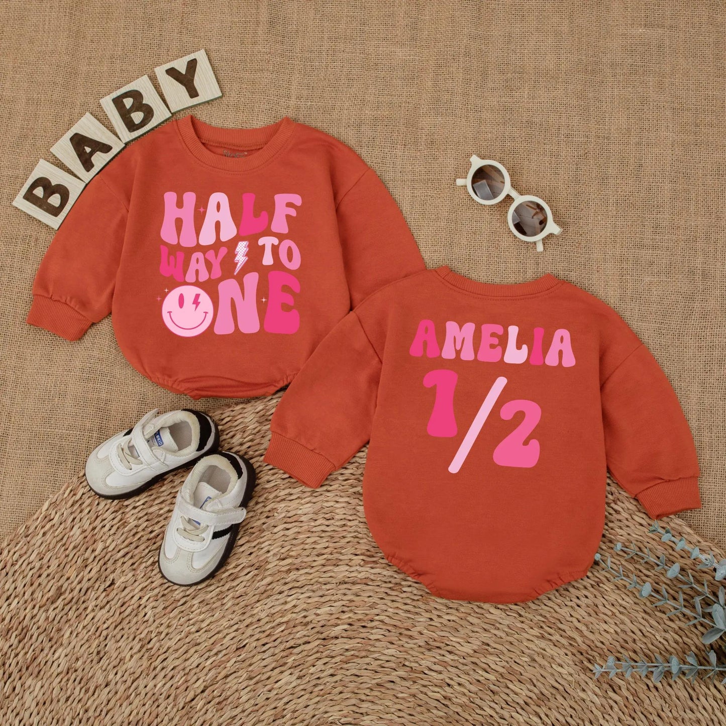 Personalized Pink Half Way to One Baby Girl Romper with Custom Name, Playful Smiley Face Lightning Bolt 6 Month Milestone Bubble Bodysuit