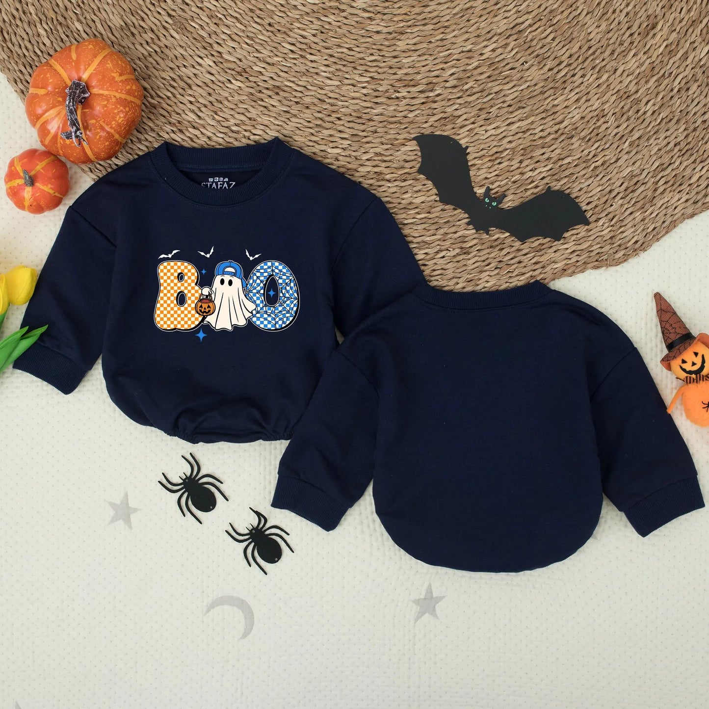 Cute Boo Ghost Toddler Halloween Shirt with Checkerboard Letters Bats and Stars Playful Blue Baseball Cap Pumpkin Candy Bucket Design