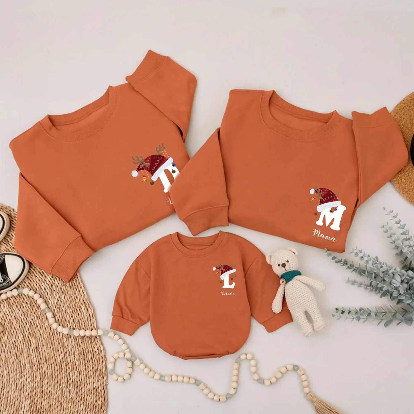 Custom Christmas Matching Family Sweatshirts with Personalized Santa Hat Reindeer Antlers Initial Name Design Playful Holiday Comfort Gift