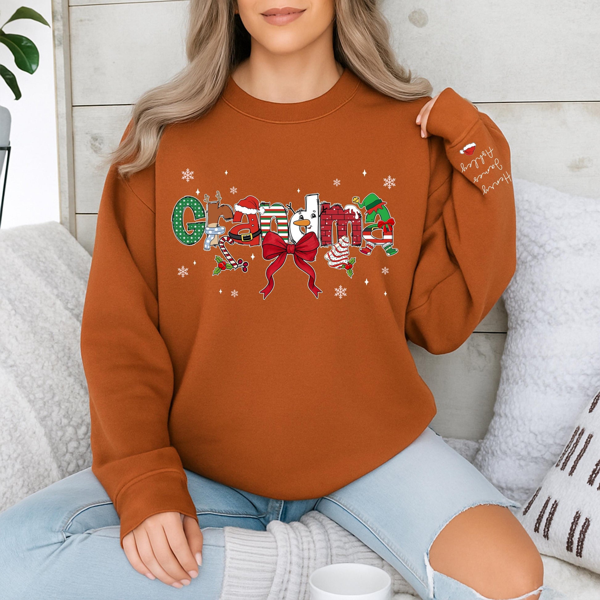Custom Christmas Grandma Sweater with Grandkids Names on Sleeve Festive Santa Hat Snowman Candy Cane Design Gift for Nana