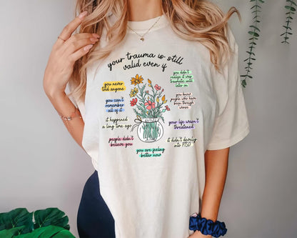 Your Trauma Is Still Valid Pastel Tee Inspirational Shirt with Floral Design Positive Vibes Graphic Tee, Comfort Cotton Top