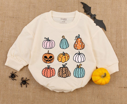Whimsical Cartoon Pumpkin Print Baby Romper with Playful Pink Blue Orange Yellow White Patterned Designs for a Fun First Halloween Fall Outfit