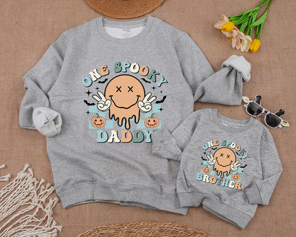 One Spooky Dude Halloween Birthday Sweatshirt 1st Baby Boy Retro Smiley Face Melting Pastel Pumpkin Patch Checkered Design Family Apparel