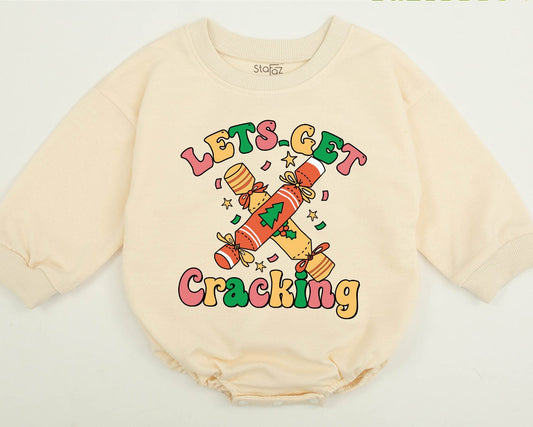 Cute Retro Christmas Baby Sweater "Let's Get Cracking" Vintage Holiday Toddler Sweatshirt Festive Cracker Design with Colorful Pink Orange Yellow Green Details
