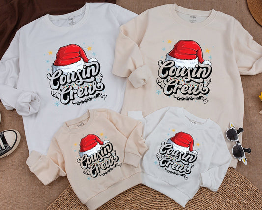 Cousin Crew Christmas Sweatshirt with Santa Hat and Lights, a festive family matching top for kids, baby, toddlers, and adults this holiday season.