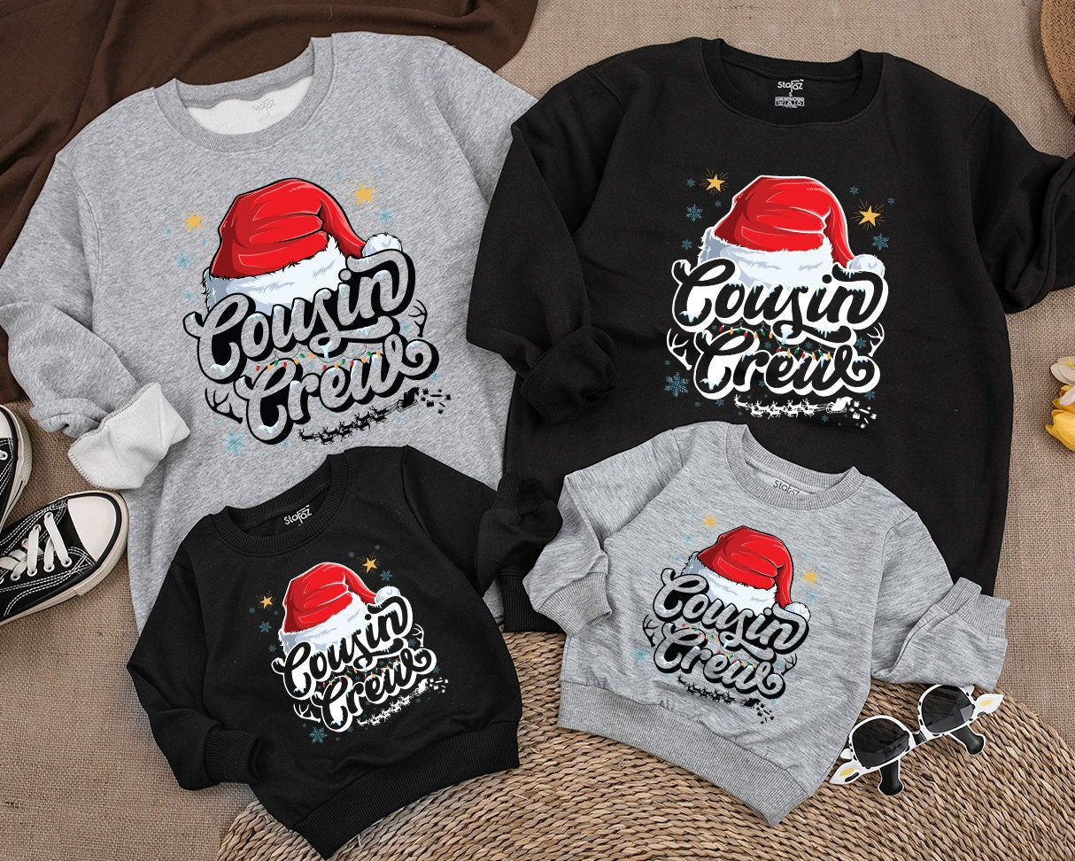 Cousin Crew Christmas Sweatshirt with Santa Hat and Lights, a festive family matching top for kids, baby, toddlers, and adults this holiday season.