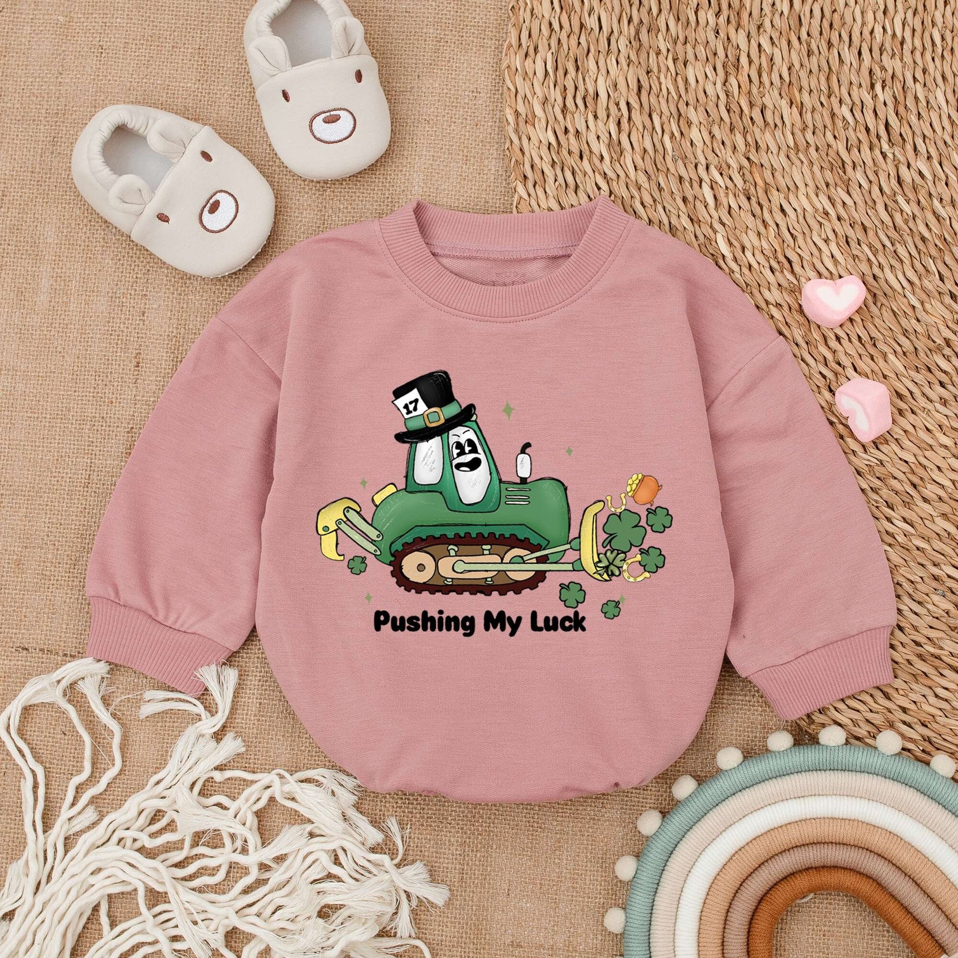 St Patrick's Day Baby Romper with Pushing My Luck Bulldozer Design Green Shamrocks Pot of Gold Leprechaun Hat Light Mauve Newborn Outfit