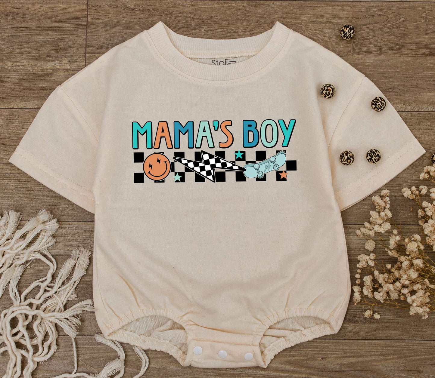 Mama's Boy Retro Baby Romper with Playful Checkerboard Smiley Face Skateboard Design in Teal Orange for Little Boys Soft Cotton Outfit