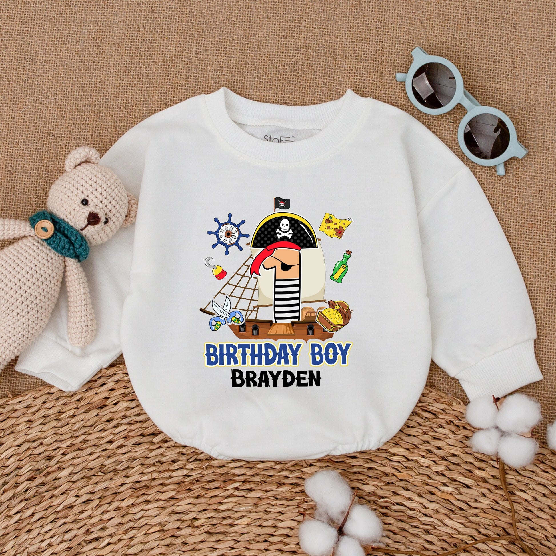 Personalized Pirate First Birthday Boy Romper featuring a Whimsical Cartoon One with Eye Patch Hat and Treasure Design Bodysuit
