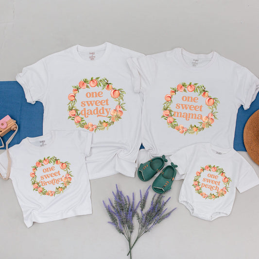 Custom Peach 1st Birthday Matching Family Shirts One Sweet Peach Baby Girl Party Outfits with Retro Font Muted Peach Wreath Design