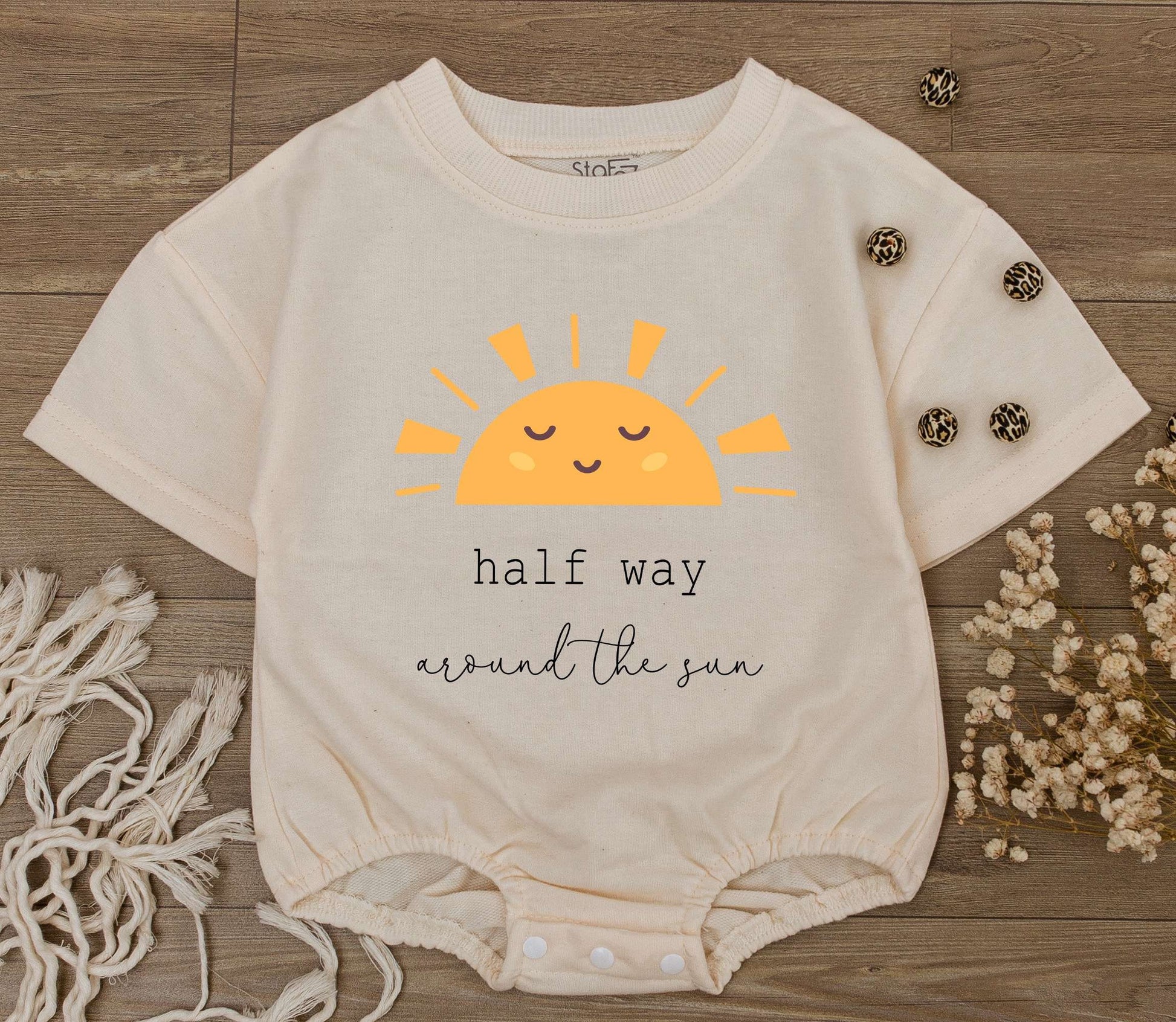 Baby Half Way Around The Sun Romper for 6 Month Birthday Celebration featuring a playful smiling sun graphic soft cotton natural gift outfit