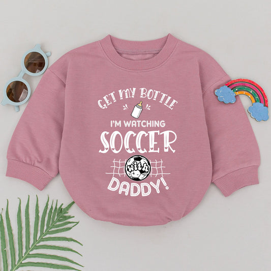Get My Bottle I'm Watching Soccer With Daddy Baby Boy Romper adorable Father's Day Game Day outfit with whimsical black print baby bottle and soccer ball design