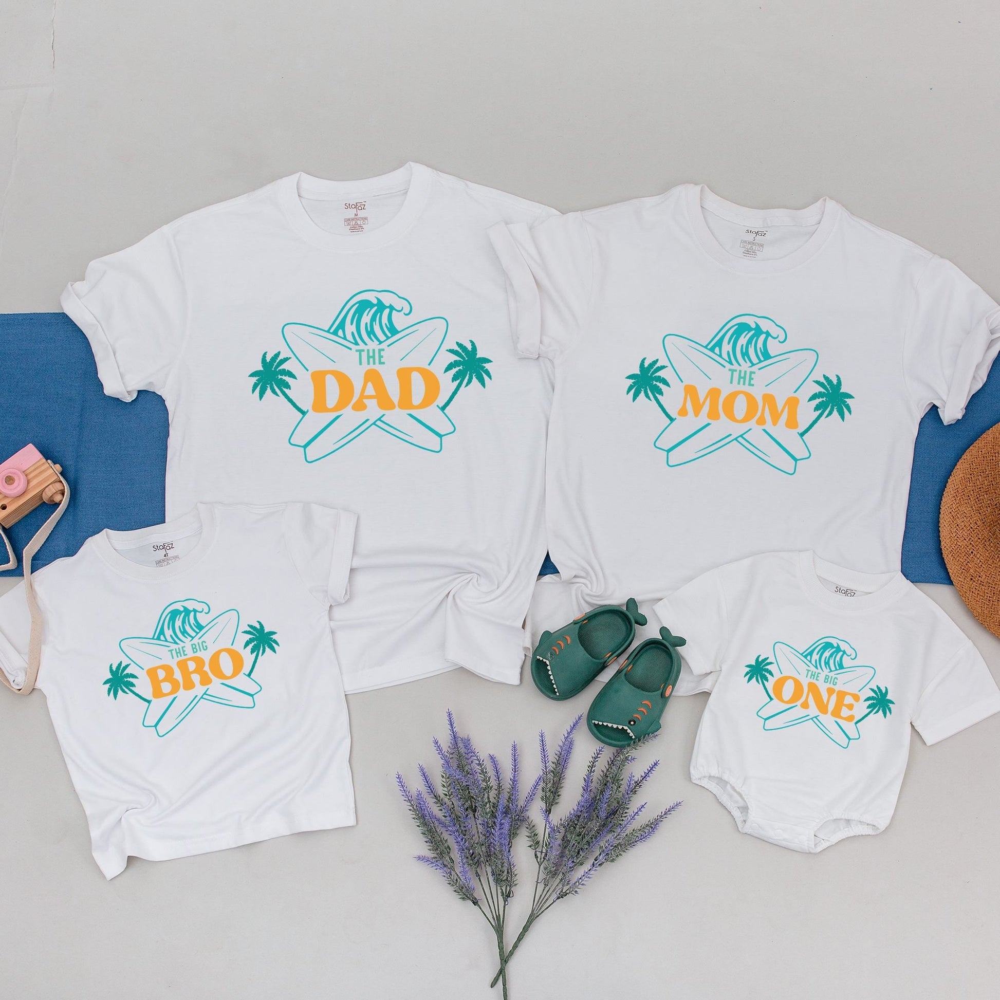 Matching Family Surf Birthday Shirts for The Big One First Birthday featuring a cool teal wave and golden palm trees perfect beach party tees