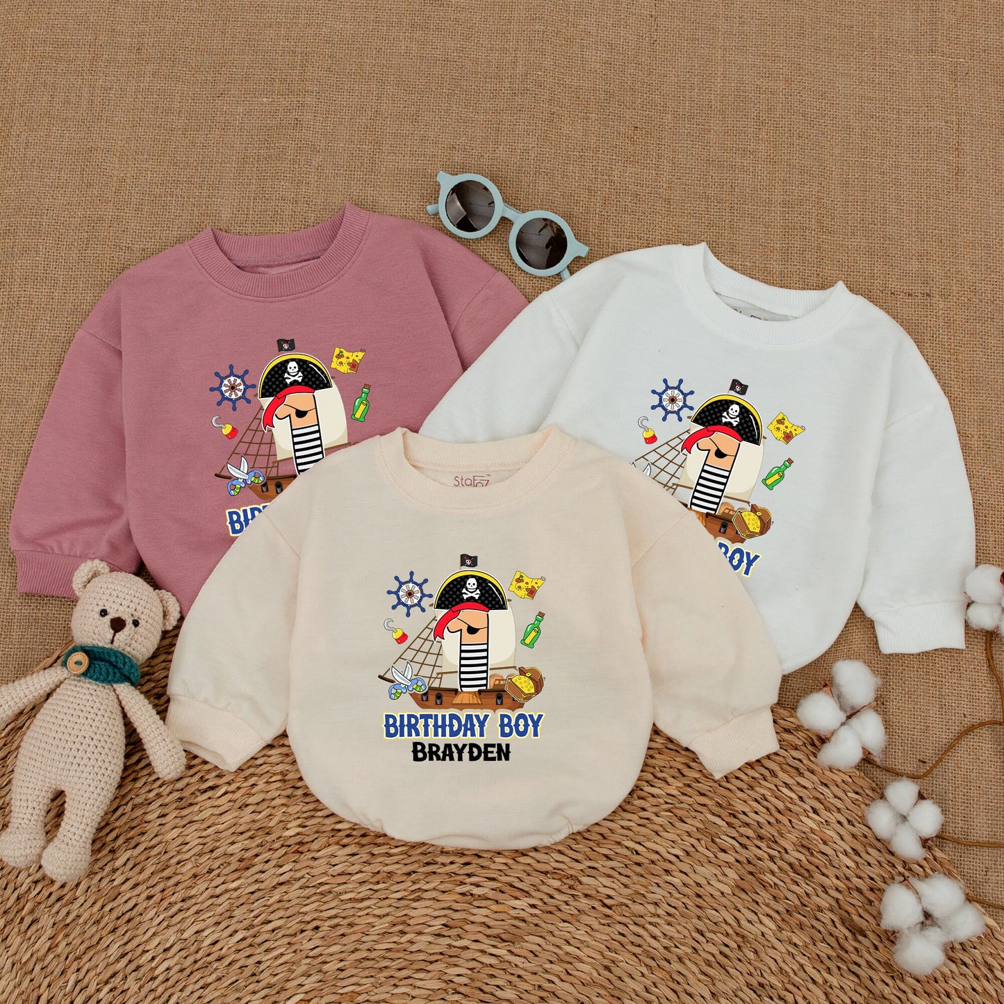 Personalized Pirate First Birthday Boy Romper featuring a Whimsical Cartoon One with Eye Patch Hat and Treasure Design Bodysuit