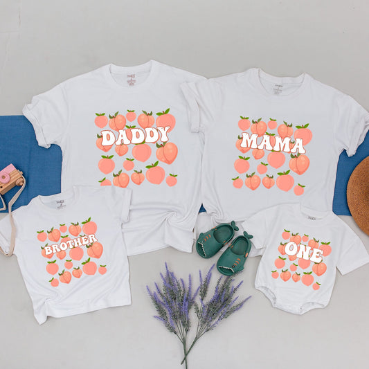 One Sweet Peach 1st Birthday Shirt Matching Family Party Outfit featuring playful light orange cartoon peaches and retro style text for celebration