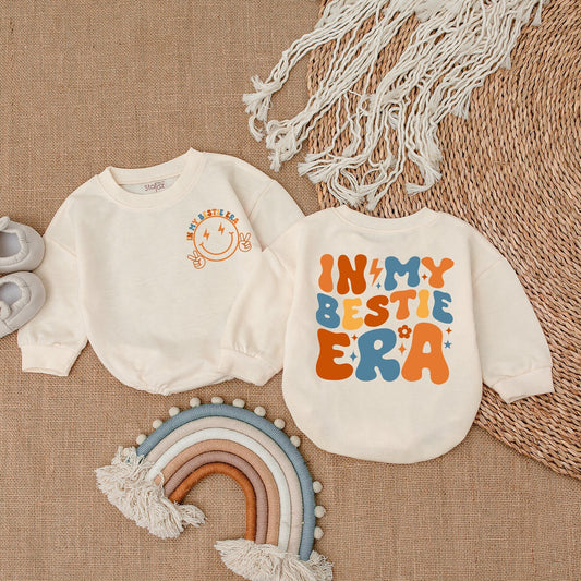 In My Bestie Era Baby Girl Romper, Playful Retro Smiling Face Design with Colorful Orange Blue Yellow Floral Stars, Oversized Sweater Gift