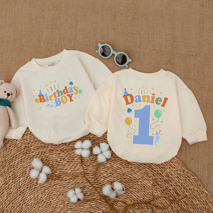 Personalized First Birthday Boy Romper Daniel's Name Bright Blue Orange Cake Smash Outfit with Confetti Candles Balloons Party Hat Design