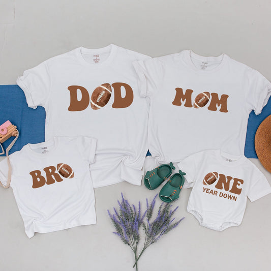 One Year Down Football First Birthday Matching Family Shirts with Brown Block Lettering Realistic Sports Game Day Theme Party Outfits